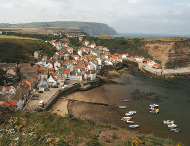 From high up on the cliffs on the England Coast Path, we look down on Robin Hood's Bay.